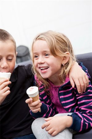 Siblings eating Ice-Cream Stock Photo - Budget Royalty-Free & Subscription, Code: 400-04751312