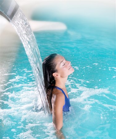 spa hydrotherapy woman waterfall jet turquoise swimming pool water Stock Photo - Budget Royalty-Free & Subscription, Code: 400-04751707