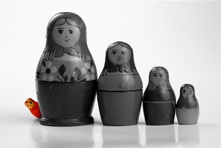 symbolized individuality with wooden matryoshkas Stock Photo - Budget Royalty-Free & Subscription, Code: 400-04751716