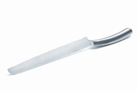 simsearch:700-05642632,k - Modern bread knife on a white background Fotografie stock - Microstock e Abbonamento, Codice: 400-04752298