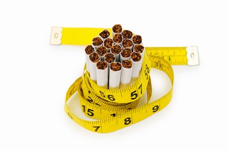 simsearch:400-09029516,k - Smoking concept with measuring tape and cigarettes Foto de stock - Super Valor sin royalties y Suscripción, Código: 400-04752939