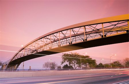 Traffic on Lake Shore Drive and the pedestrian bridge. Taken during sunset with tobacco filter. Stock Photo - Budget Royalty-Free & Subscription, Code: 400-04753867