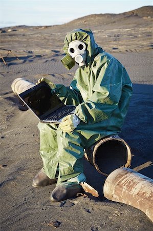 scientist laptop - Scientist working with the computer in the infected areas Stock Photo - Budget Royalty-Free & Subscription, Code: 400-04764435