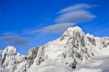 simsearch:400-04299207,k - Beautiful snow-capped mountains against the blue sky in Antarctica Stock Photo - Budget Royalty-Free & Subscription, Code: 400-04764548