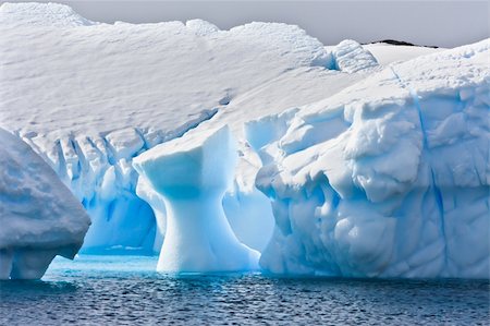 simsearch:400-04299207,k - Huge iceberg in Antarctica, blue sky, azure water, sunny day Stock Photo - Budget Royalty-Free & Subscription, Code: 400-04764554