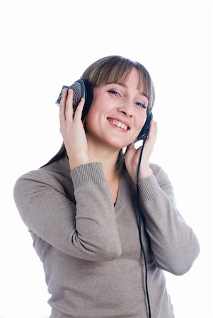 simsearch:400-05717354,k - Young woman with headphones listening to loud music at isolated background. Stock Photo - Budget Royalty-Free & Subscription, Code: 400-04764670