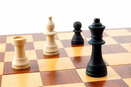 simsearch:640-01350185,k - chess piece isolated on white background advising to strategic behavior Photographie de stock - Aubaine LD & Abonnement, Code: 400-04764815