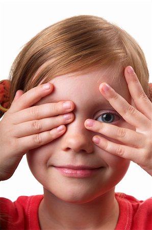 simsearch:400-06130548,k - Little girl peeping through hand with one eye isolated over white background Foto de stock - Super Valor sin royalties y Suscripción, Código: 400-04764977