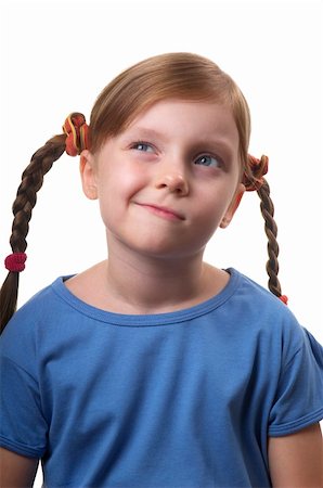 Thinking funny smiling little girl portrait isolated over white background Fotografie stock - Microstock e Abbonamento, Codice: 400-04764970