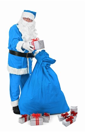 simsearch:400-07332398,k - Santa claus in blue costume gives a present on white background Photographie de stock - Aubaine LD & Abonnement, Code: 400-04765264