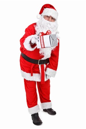 simsearch:400-07332398,k - Santa claus gives a present on white background Photographie de stock - Aubaine LD & Abonnement, Code: 400-04765263