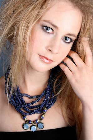 simsearch:400-04266572,k - Beautiful female model with blue eyes wearing jewelery Stock Photo - Budget Royalty-Free & Subscription, Code: 400-04765301