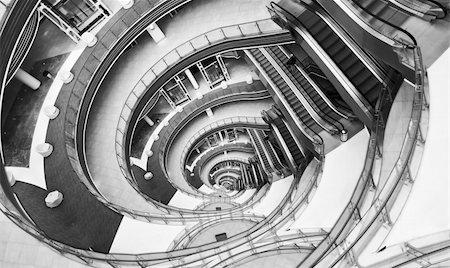 stairs on tunnel - View down in a modern hall. Image looks like infinity twisted spiral. Stock Photo - Budget Royalty-Free & Subscription, Code: 400-04765861