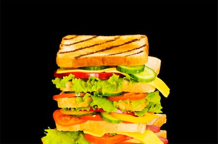 simsearch:400-07568675,k - Sandwich isolated on the black background Foto de stock - Super Valor sin royalties y Suscripción, Código: 400-04766089