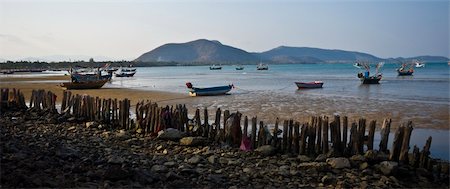 old fishermen vessels in the bay of Ao Noi Stock Photo - Budget Royalty-Free & Subscription, Code: 400-04766285