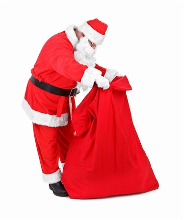 simsearch:400-07332398,k - Santa Claus is looking for gifts on white background Photographie de stock - Aubaine LD & Abonnement, Code: 400-04766367