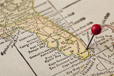 Florida vintage 1920s map (printed in 1926 - copyrights expired) with a red pushpin on Miami, selective focus Stock Photo - Budget Royalty-Free & Subscription, Code: 400-04766645