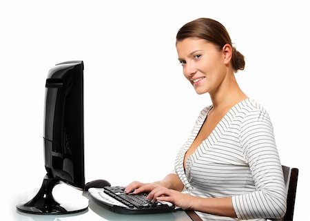 secretary model - A picture of a young cute girl working on computer over white background Stock Photo - Budget Royalty-Free & Subscription, Code: 400-04767550