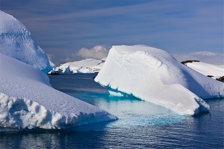 simsearch:400-04299207,k - Huge icebergs in Antarctica, blue sky, azure water, sunny day Stock Photo - Budget Royalty-Free & Subscription, Code: 400-04767626