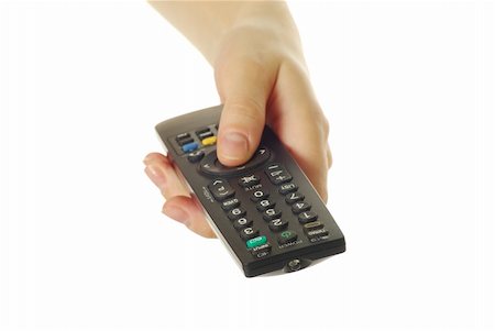 radio and television use of computer - remote control in hand isolated on white background Stock Photo - Budget Royalty-Free & Subscription, Code: 400-04767899