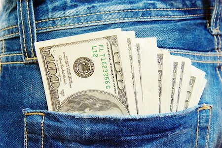 dollars in a pocket of jeans Stock Photo - Budget Royalty-Free & Subscription, Code: 400-04768023