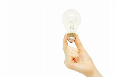 simsearch:400-04263435,k - Female hand holding bulb isolated on white background Photographie de stock - Aubaine LD & Abonnement, Code: 400-04768070