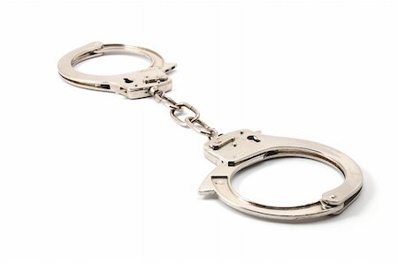 police handcuffs isolated on a white background Stock Photo - Budget Royalty-Free & Subscription, Code: 400-04768419