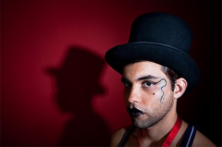 simsearch:400-05285711,k - Man in top hat with shadow on the wall Stock Photo - Budget Royalty-Free & Subscription, Code: 400-04768663