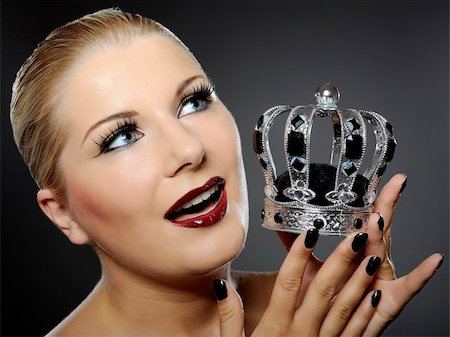 simsearch:400-04420197,k - elegant queen female face with red shiny lips and black eye makeup. colse-up. Stock Photo - Budget Royalty-Free & Subscription, Code: 400-04768730
