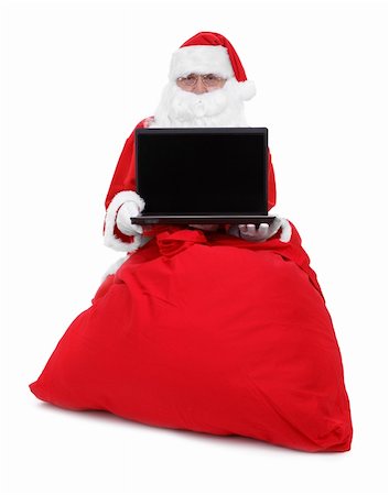 simsearch:400-05711905,k - Santa claus shows laptop with empty screen on white Stock Photo - Budget Royalty-Free & Subscription, Code: 400-04769013