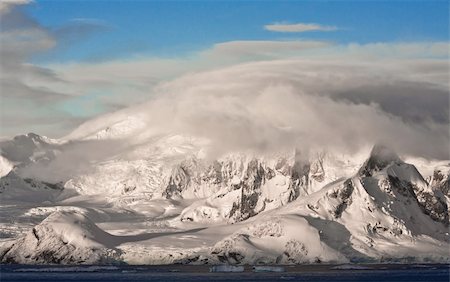 Beautiful snow-capped mountains against the sky Stock Photo - Budget Royalty-Free & Subscription, Code: 400-04760147