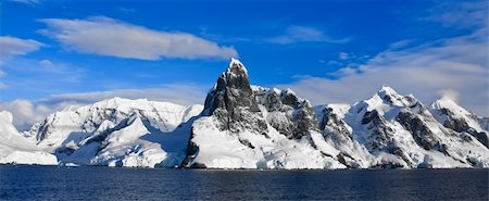 simsearch:400-04900502,k - Beautiful snow-capped mountains against the blue sky Stockbilder - Microstock & Abonnement, Bildnummer: 400-04760154