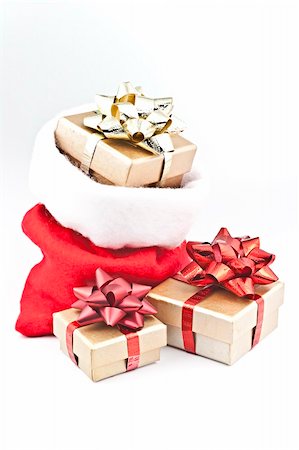 On a white background Christmas gift bag with gifts. Stock Photo - Budget Royalty-Free & Subscription, Code: 400-04760164