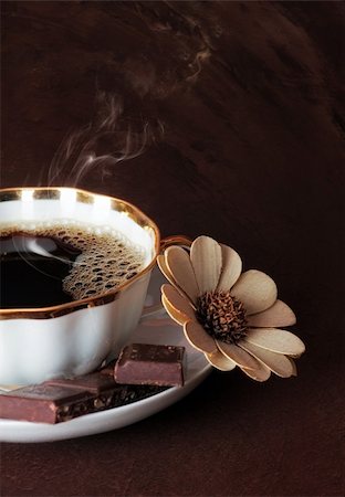 simsearch:400-07306295,k - The cup of coffee with chocolate on brown background Stock Photo - Budget Royalty-Free & Subscription, Code: 400-04760252