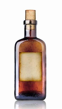 Old fashioned drug bottle with label, isolated, clipping path. Stock Photo - Budget Royalty-Free & Subscription, Code: 400-04760377