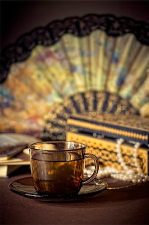 Still life with cup of tea and Women's stuff Stock Photo - Budget Royalty-Free & Subscription, Code: 400-04760497