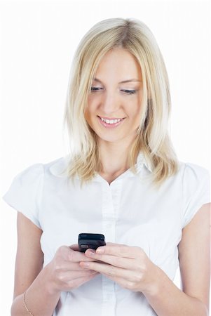 simsearch:400-05751258,k - Young woman writing sms on mobile phone at isolated background Stock Photo - Budget Royalty-Free & Subscription, Code: 400-04760551