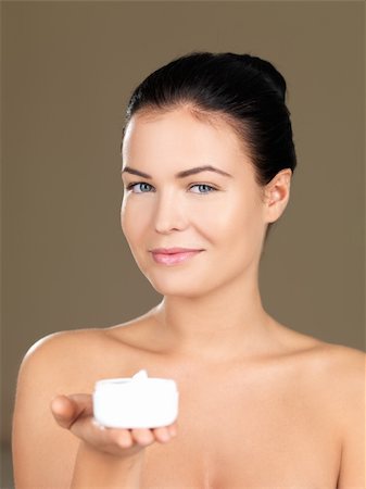simsearch:400-09030418,k - Portrait of beautiful woman, she holding cream container Stock Photo - Budget Royalty-Free & Subscription, Code: 400-04760611