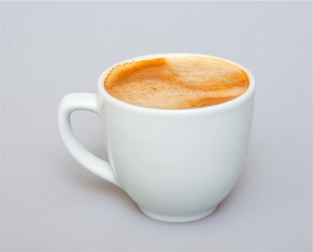 simsearch:614-06002327,k - White ceramic cup from coffee on a white background Foto de stock - Super Valor sin royalties y Suscripción, Código: 400-04760766