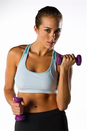 A brunette fitness model preparing to work out Stock Photo - Budget Royalty-Free & Subscription, Code: 400-04760875