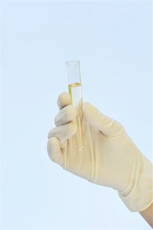 Hand holding test tube Stock Photo - Budget Royalty-Free & Subscription, Code: 400-04761128
