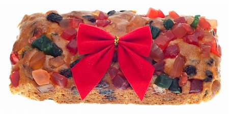 Holiday Fruit Cake Gift with a Bow Isolated on White with a Clipping Path. Stock Photo - Budget Royalty-Free & Subscription, Code: 400-04762079