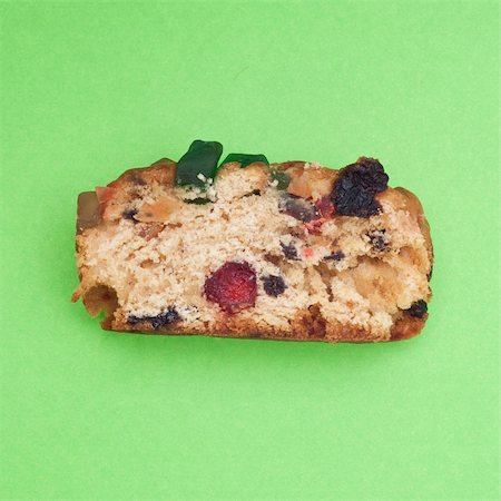 Holiday Fruit Cake on a Vibrant Green Background. Stock Photo - Budget Royalty-Free & Subscription, Code: 400-04762082