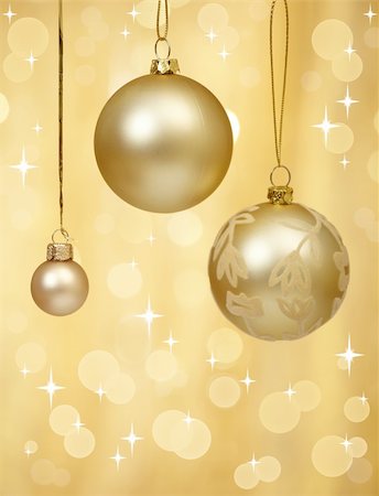 three different christmas baubles on shiny background Stock Photo - Budget Royalty-Free & Subscription, Code: 400-04762638