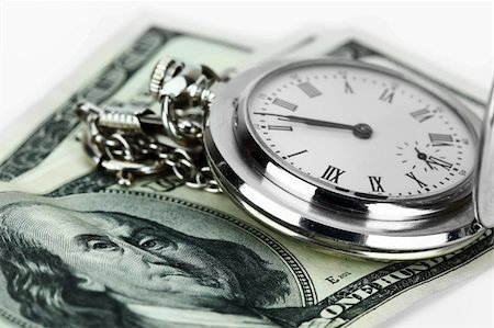 Watches and money on a white background Fotografie stock - Microstock e Abbonamento, Codice: 400-04762688