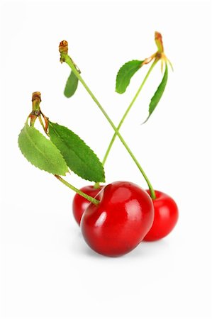 Cherries on white background Fotografie stock - Microstock e Abbonamento, Codice: 400-04762756