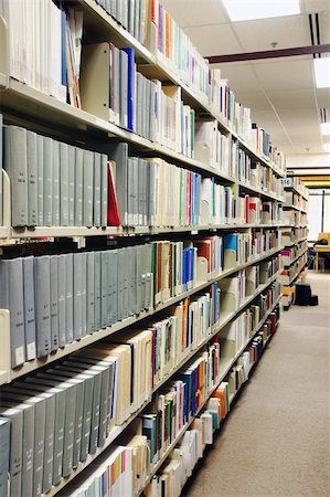 Rows of grey books at the school library, university or college. Fotografie stock - Microstock e Abbonamento, Codice: 400-04762771
