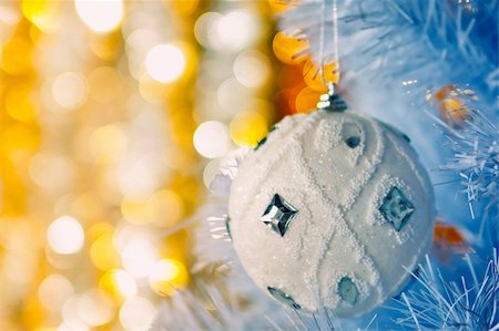 simsearch:400-05177023,k - Christmas tree with white bauble. Colorful bokeh in the background. Stock Photo - Budget Royalty-Free & Subscription, Code: 400-04763456