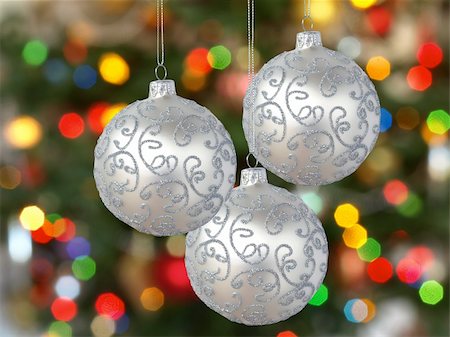 Three silver  balls  on Christmas tree background Photographie de stock - Aubaine LD & Abonnement, Code: 400-04774180