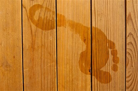 Wet footprints on wooden planks. Foto de stock - Royalty-Free Super Valor e Assinatura, Número: 400-04774355